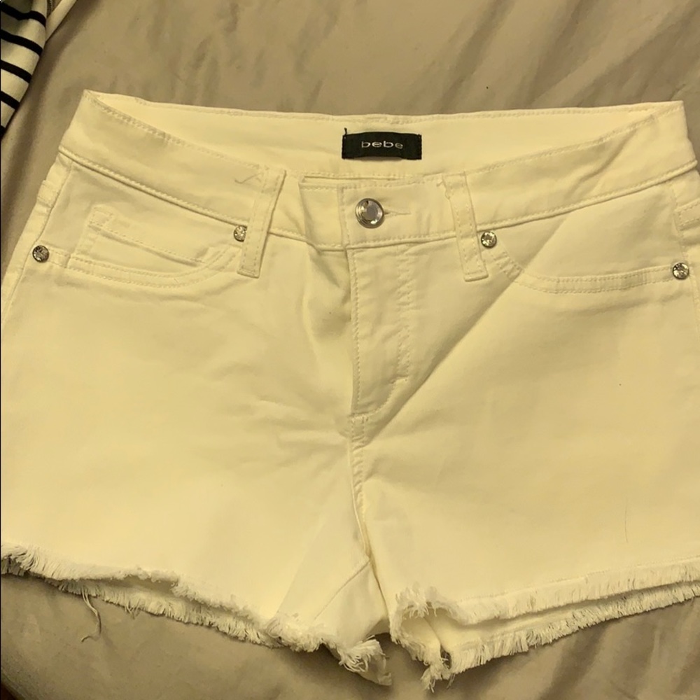 White cutoff shorts